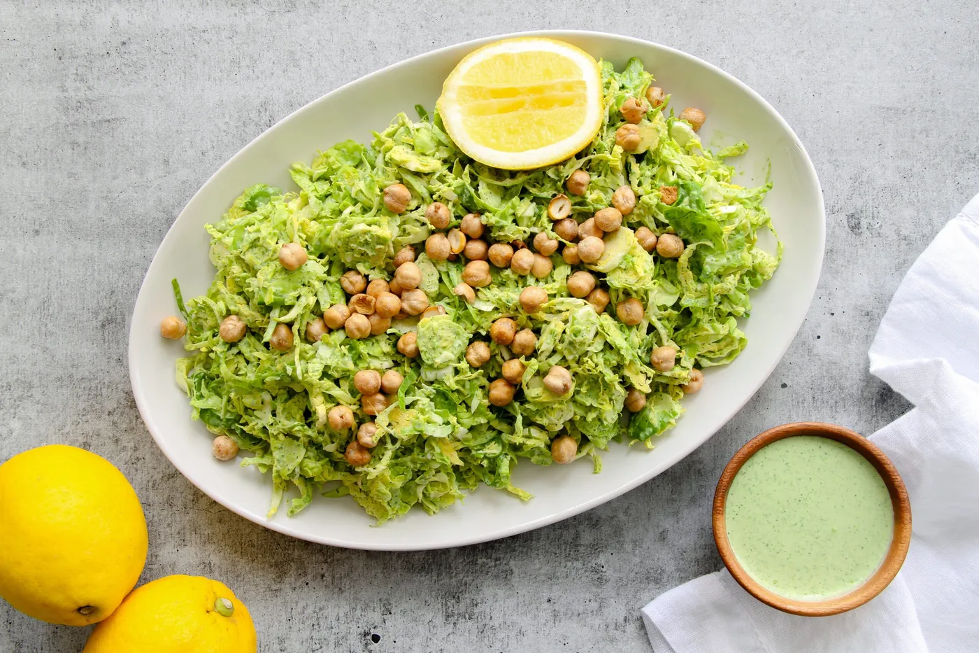 Shaved Brussels Sprouts Salad with Green Goddess Dressing and Crispy Chickpeas